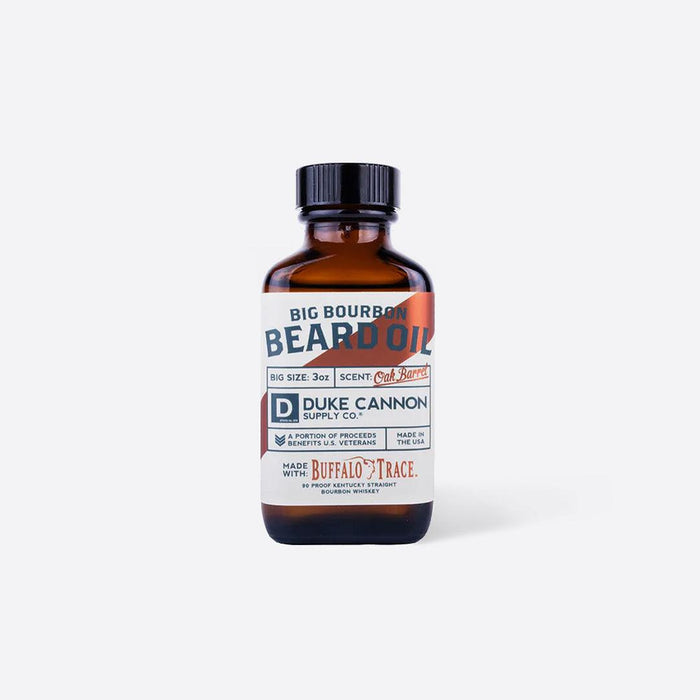 Duke Cannon Big Bourbon beard oil bottle, mens grooming oil shown on a plain background