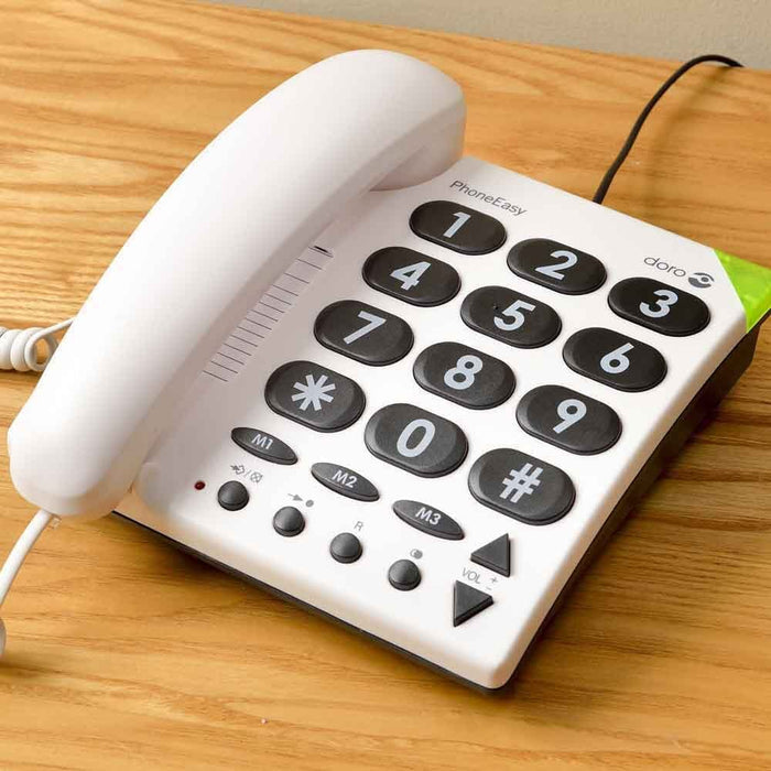Big Button Telephone being held in a hand, showing the size of the buttons and screen.