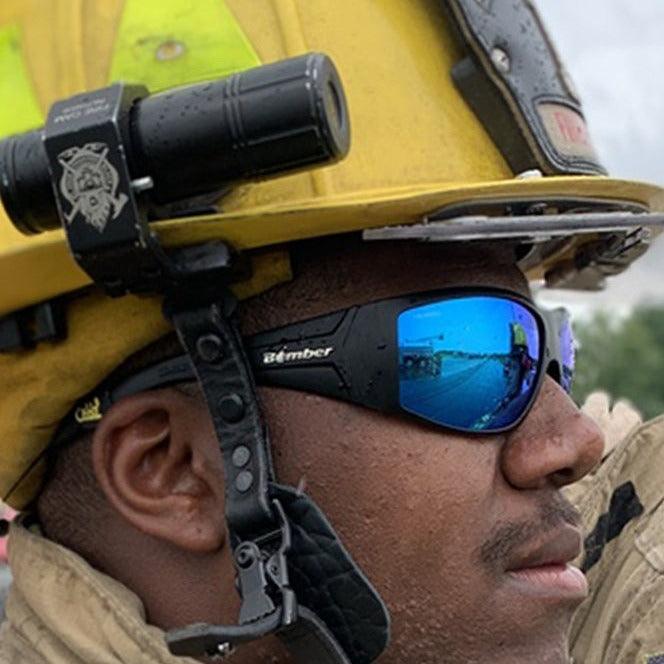 Firefighter wearing the Bomber Ahi Bomb Z87+ ice blue mirror safety sunglasses on the job