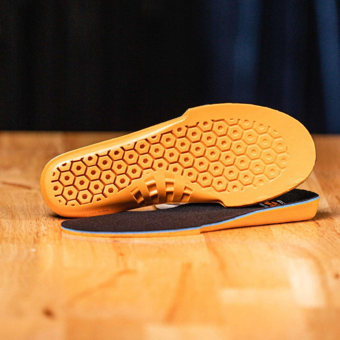 Timberland PRO anti-fatigue insoles shown alongside work shirts and accessories