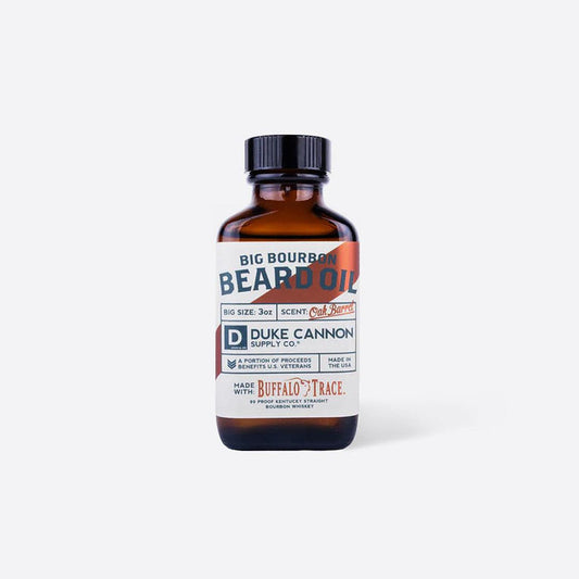 Duke Cannon Big Bourbon beard oil bottle, mens grooming oil shown on a plain background