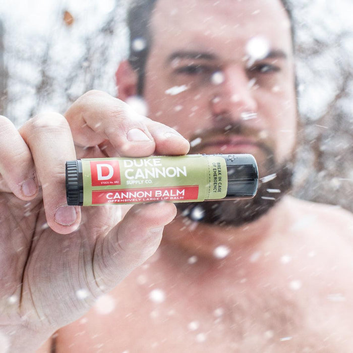 Duke Cannon Cannon Balm tactical lip balm shown in cold weather use