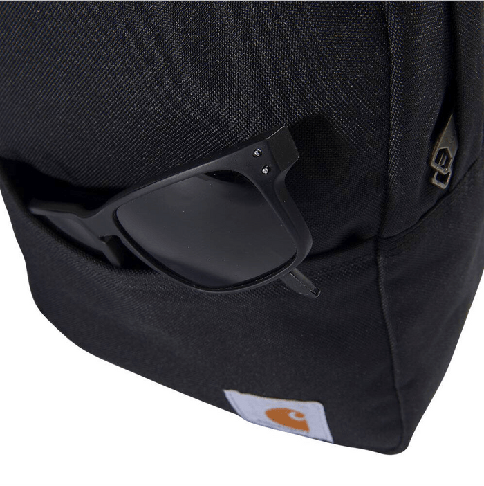 Black Carhartt mini backpack, view of the water repellent duck canvas shell