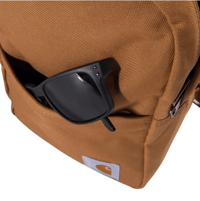 Brown Carhartt mini backpack, view of the water repellent duck canvas shell