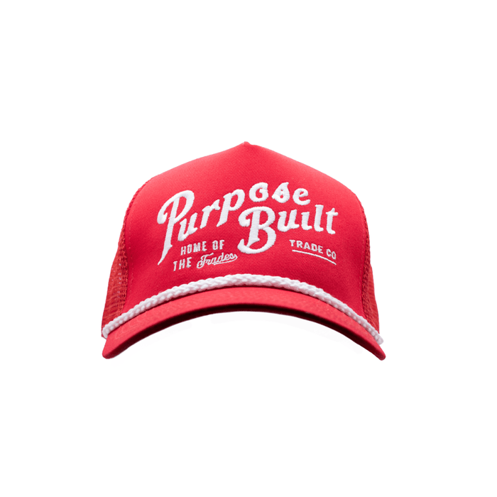 Purpose-Built Freightline trucker hat in red, front view of the logo patch