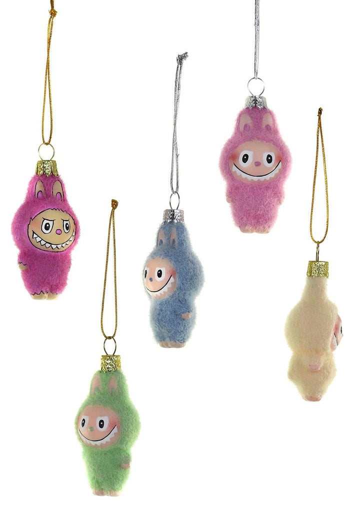 Set of colorful plush toy figures hanging from strings on a white background