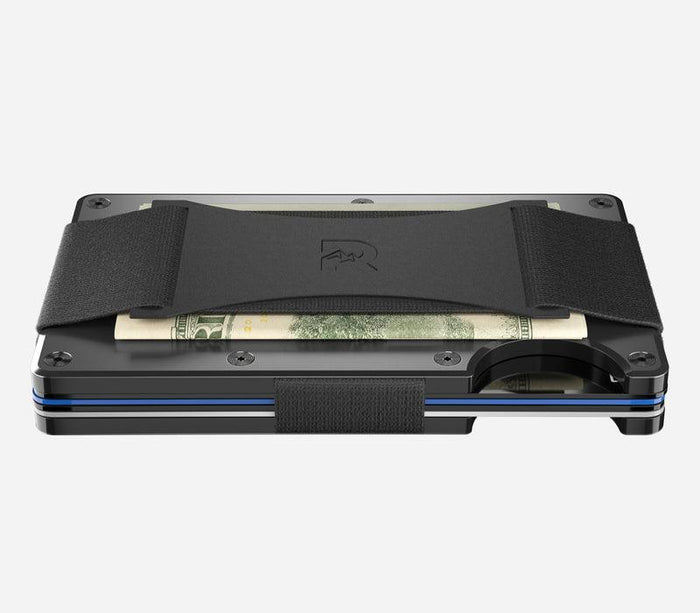 Angled view of the gunmetal Ridge aluminum minimalist wallet with cash strap