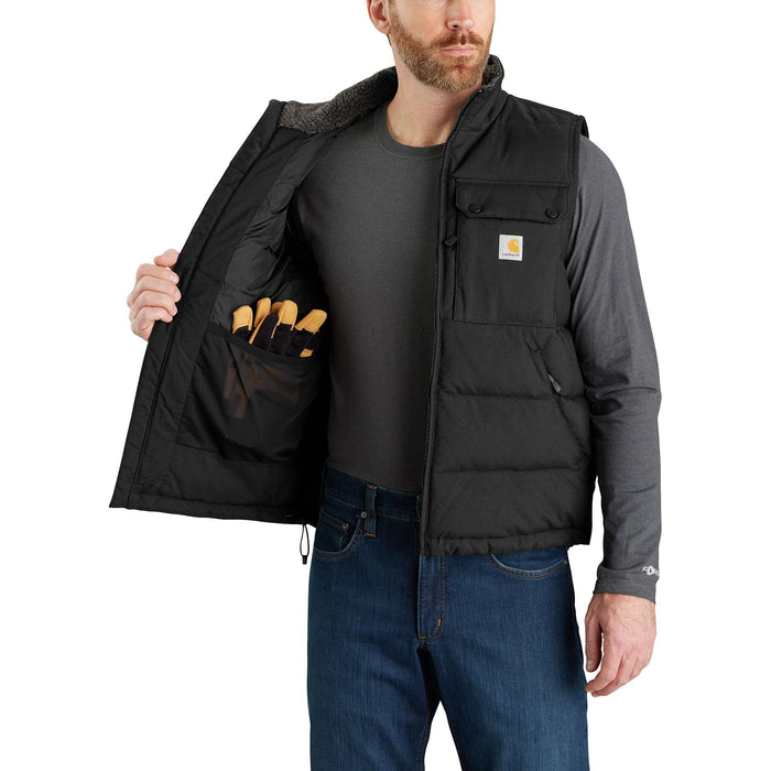 Close-up detail of the black Carhartt Montana insulated vest showing zipper hardware and reinforced stitching