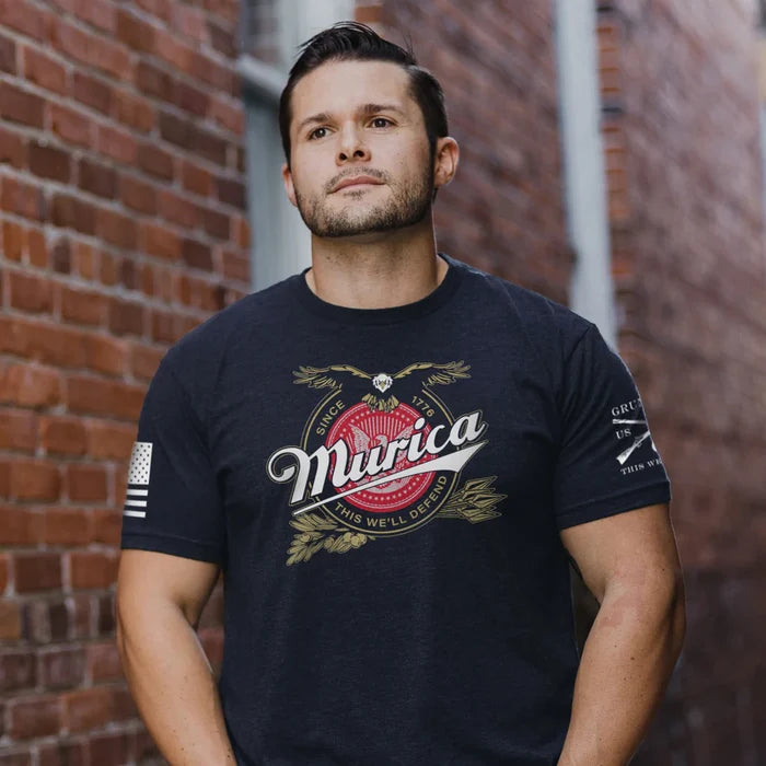 Grunt Style Murica Since 1776 tee in midnight navy shown on a model