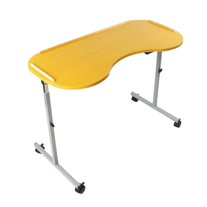Front view of NRS Curved Adjustable Overbed Table with the table top tilted, showing the raised lips and attractive beech finish.