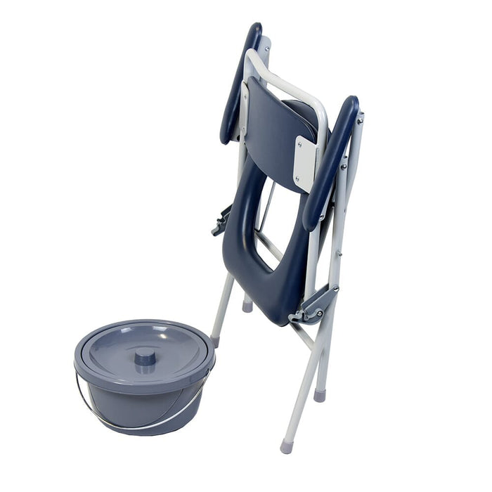 NRS Dovedale Folding Commode positioned in a home environment such as a bedroom or bathroom, demonstrating its discreet appearance.