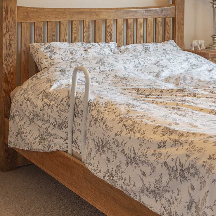 Lifestyle image of NRS Folding Easy Fit Bed Rail being used in a real-life setting.