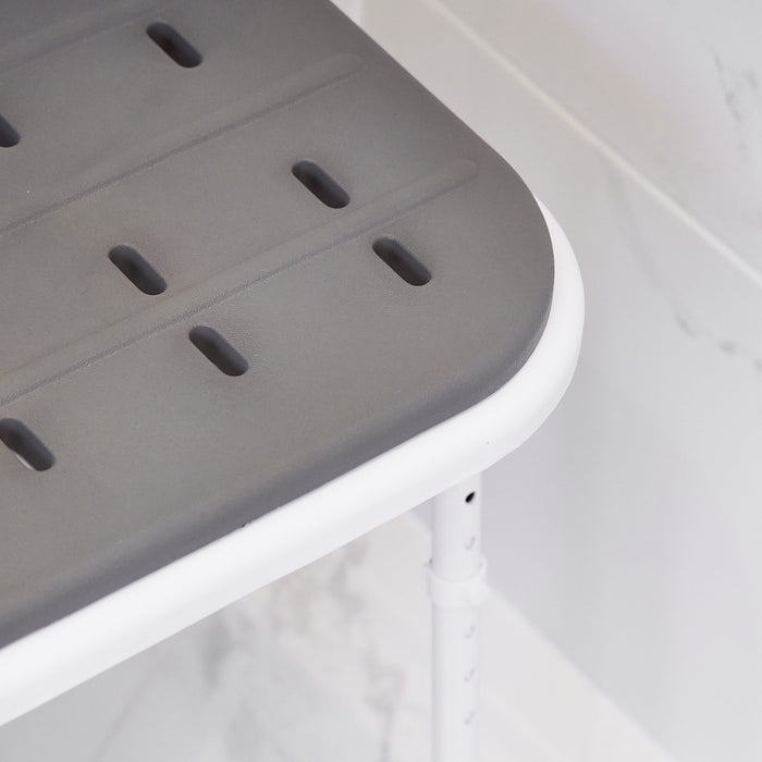 Lifestyle image of NRS Folding Shower Seat with Legs and Padded Seat being used in a real-life setting.