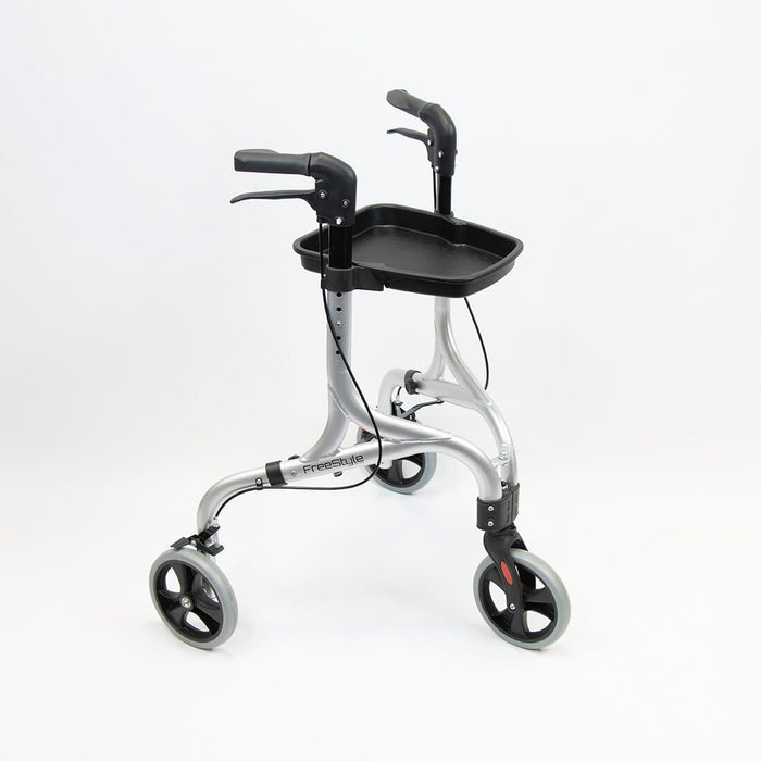 Close-up of the brake mechanism on NRS Freestyle Rollator Tray rollator's wheel with spring and cable detail.