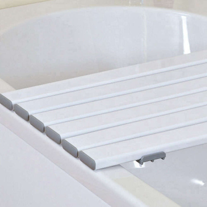 Close-up of the textured, slip-resistant surface or drainage holes on NRS Heavy Duty Slatted Shower Board bath board.