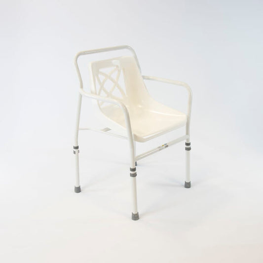 Angled view of NRS Height Adjustable Economy Shower Chair with moulded seat, supportive backrest and height-adjustable legs on a plain background.