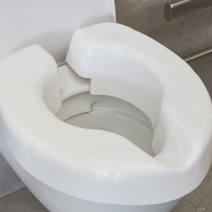 Close-up of a feature of NRS Novelle Clip On Raised Toilet Seat.