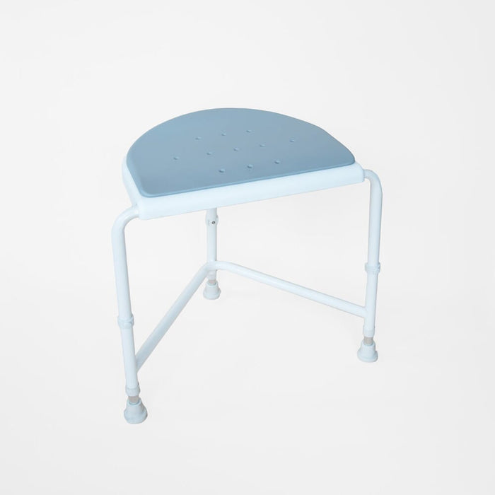 Angled view of NRS NUVO Padded Corner Shower Stool shower stool with moulded seat and height-adjustable legs on a plain background.