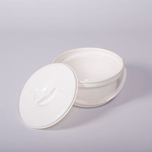 Nuvo Petite Commode Spare Potty with lid raised showing the open seat and removable commode pan, with supportive arms and adjustable height on a plain background.