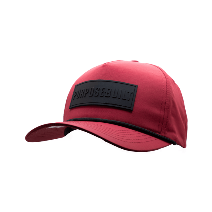 Purpose-Built rubber patch water resistant hat in ruby, left three-quarter view
