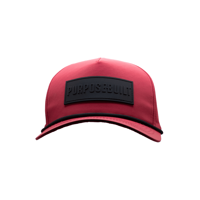 Purpose-Built rubber patch water resistant hat in ruby, front view of the rubber logo patch