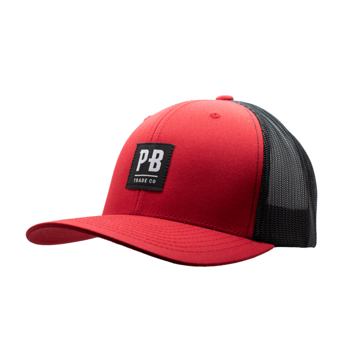 Purpose-Built PB Stadium curved brim hat in red and black, left three-quarter view