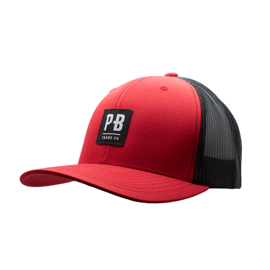 Purpose-Built PB Stadium curved brim hat in red and black, left three-quarter view