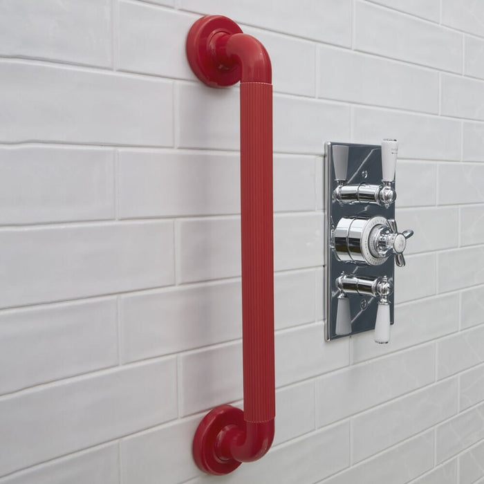 Close-up of the textured or fluted grip section on Plastic Fluted Grab Rail-450mm 18-Red grab rail, highlighting the anti-slip surface.