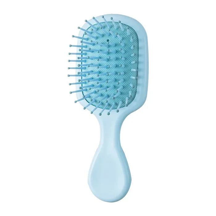 "Portable" small hairbrush blue