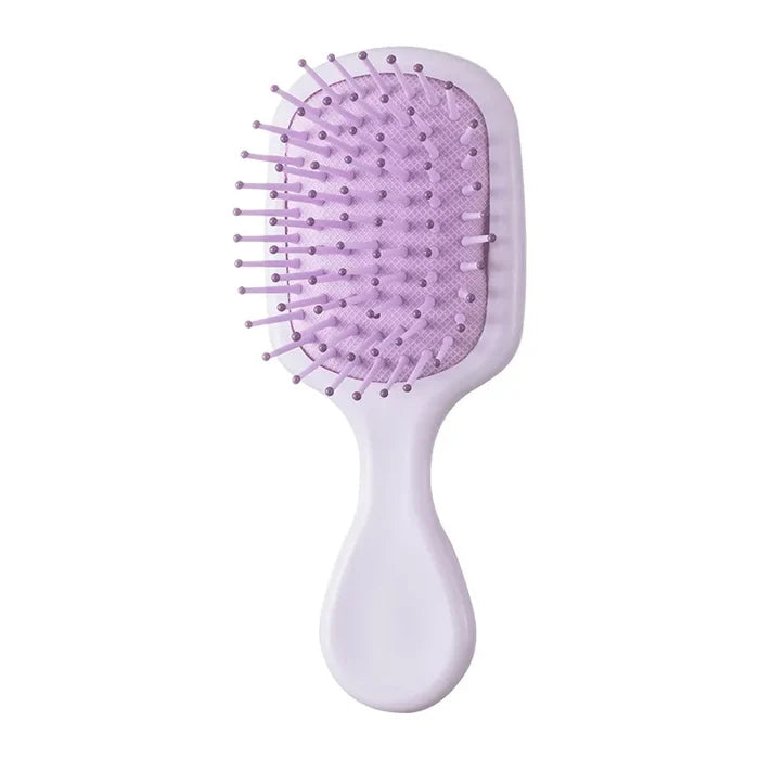 "Portable" small hairbrush lila