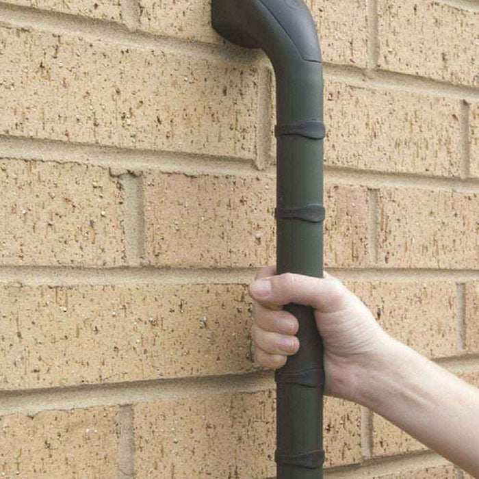 Full view of Prima Outdoor Grab Rail grab rail with circular wall plates and a textured grip, designed to provide support in bathrooms and other areas.