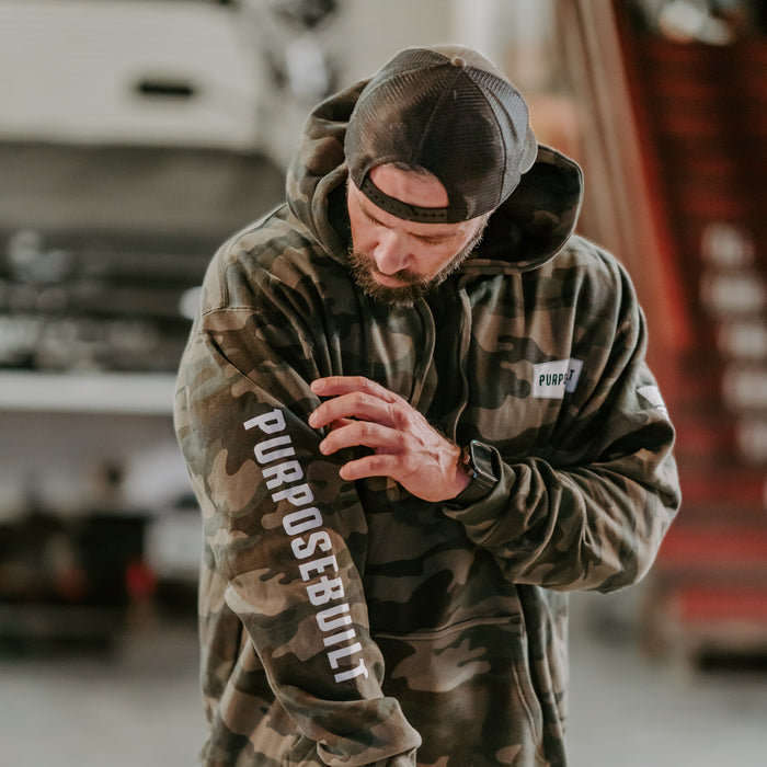 Purpose-Built camo logo hoodie shown worn, further product image