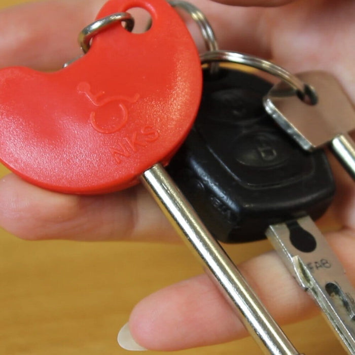 Alternative view of RADAR National Key Scheme Key With Easy Turn Red Handle, showing different angle or usage.