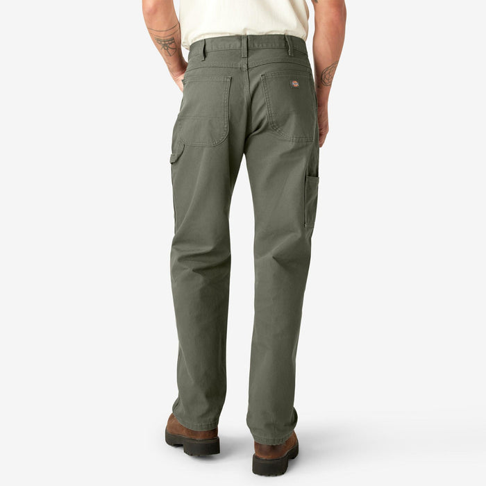 Back view of the Dickies moss green duck carpenter work pant showing the back pockets