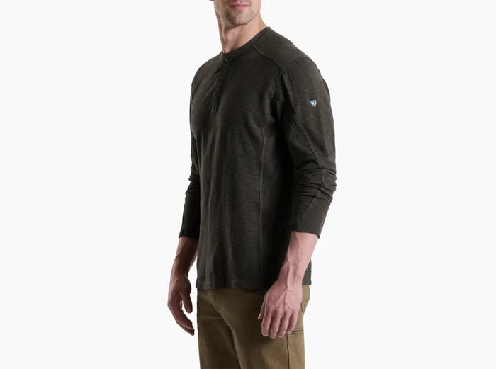 Side view of the Kuhl Rukus long sleeve henley shirt in carbon