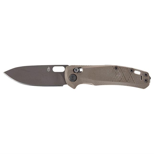 Gerber Scout everyday carry pocket knife with tan handle scales and stainless steel drop point blade