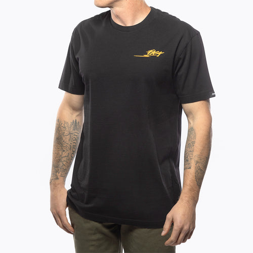 Fasthouse Tomahawk tee in black shown on a model, front view
